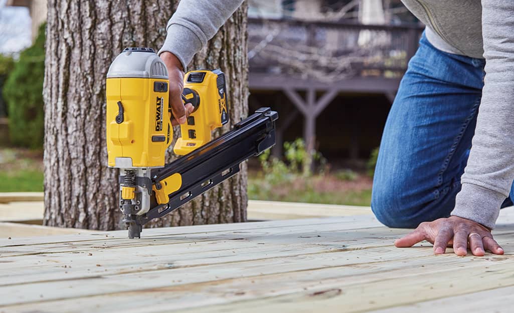 A nailer is used to attach deck boards to a platform. A nailer is used to attach deck boards to a platform.