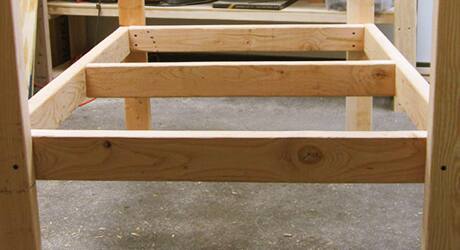 Chicken coop floor frames attached to legs. Chicken coop floor frames attached to legs.