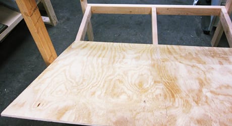 A wood floor placed in the bottom of a chicken coop. A wood floor placed in the bottom of a chicken coop.