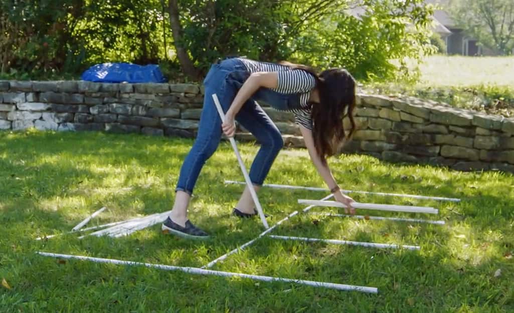 A person laying out a design for a DIY Kids Sprinkler. A person laying out a design for a DIY Kids Sprinkler.