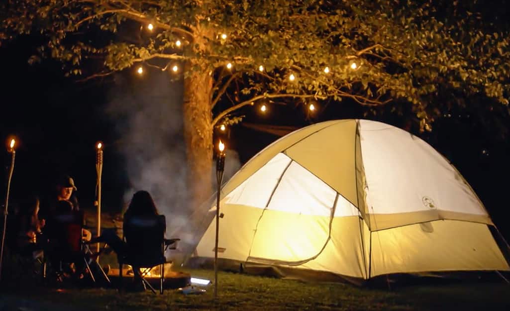 A lit campsite. A lit campsite.