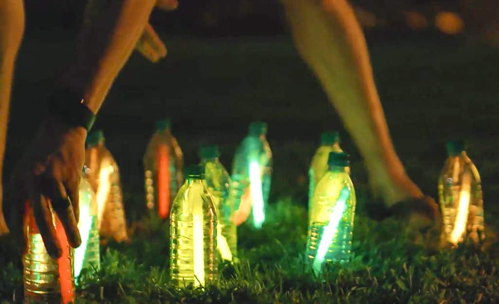 Water bottles filled with glow sticks. Water bottles filled with glow sticks.