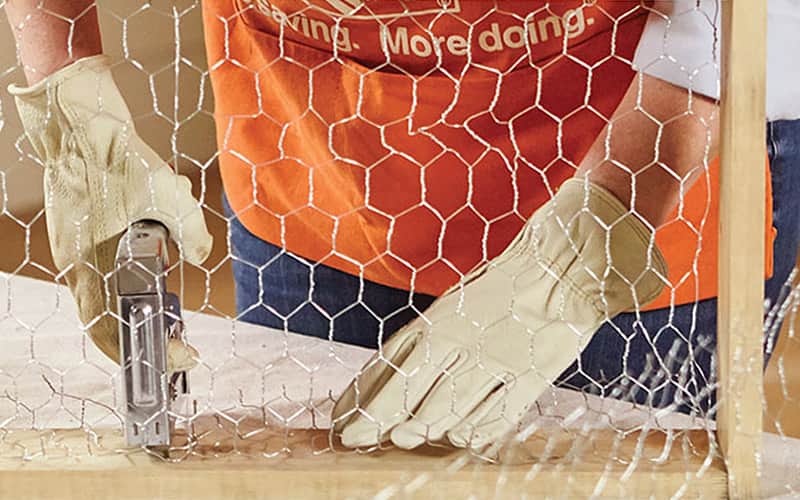 using a heavy-duty stapler to attach chicken wire using a heavy-duty stapler to attach chicken wire