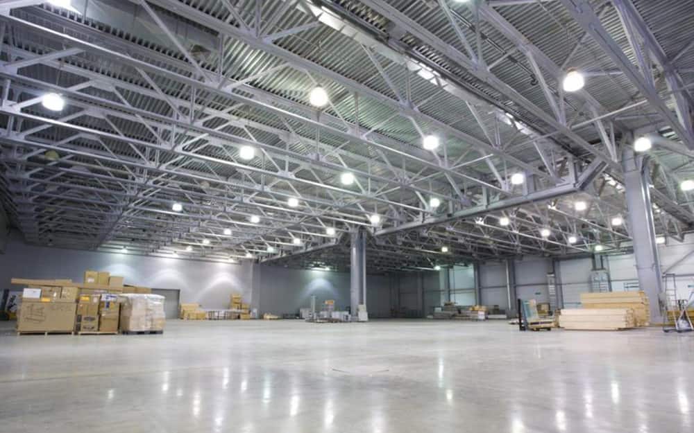 A space with high bay garage lighting. A space with high bay garage lighting.