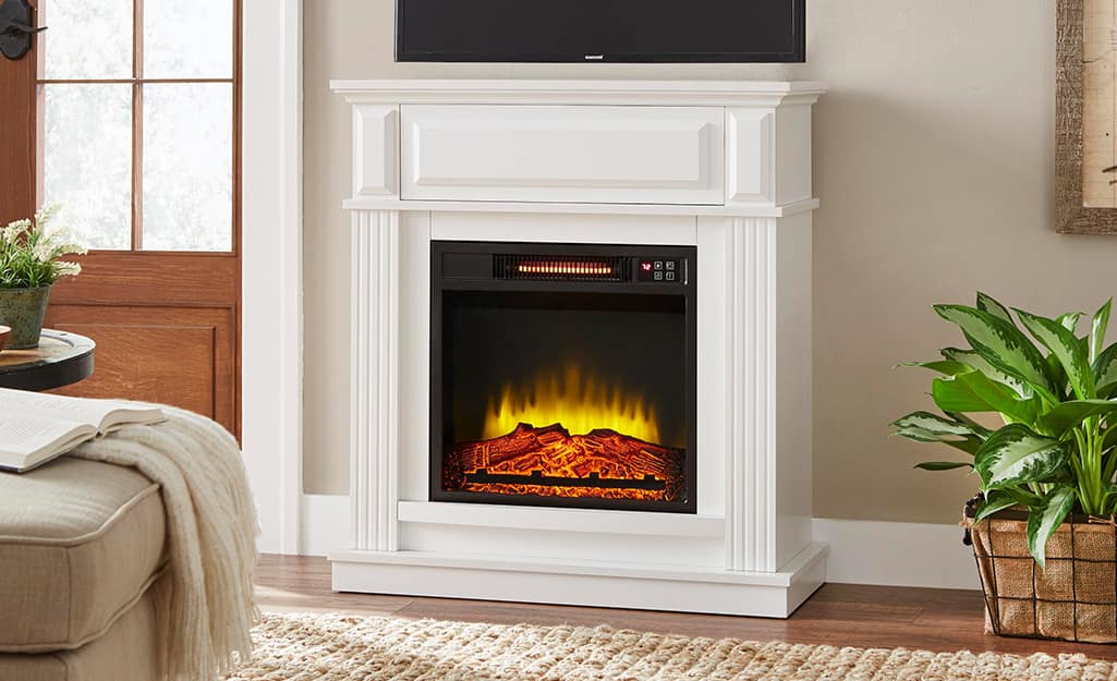 A Hampton Bay fireplace in a living room. A Hampton Bay fireplace in a living room.