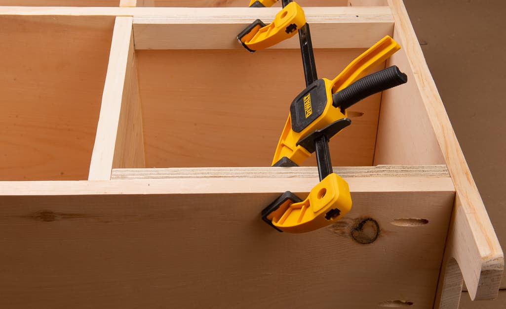 Shelves clamped together to dry. Shelves clamped together to dry.
