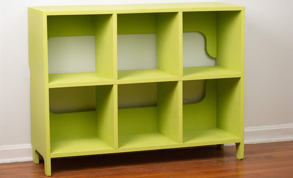 A finished kids cubby storage unit painted green. A finished kids cubby storage unit painted green.