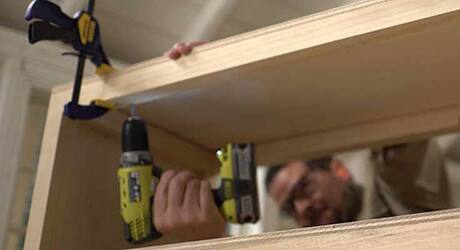 Attach top shelf and sides Attach top shelf and sides