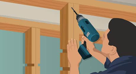 Illustration of a man drilling center shelf supports into place. Illustration of a man drilling center shelf supports into place.