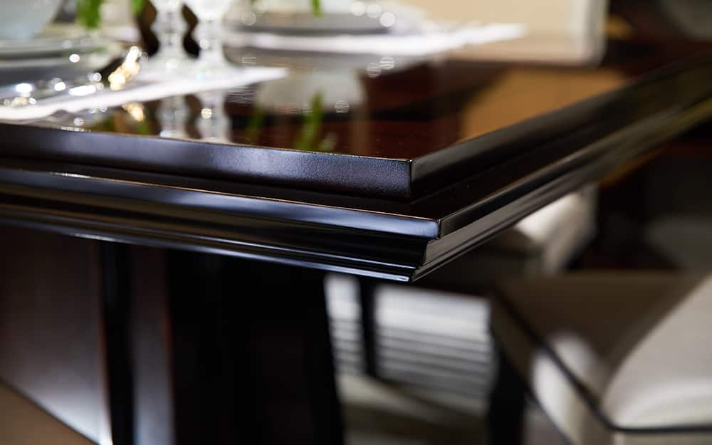 A table finished in black lacquer. A table finished in black lacquer.