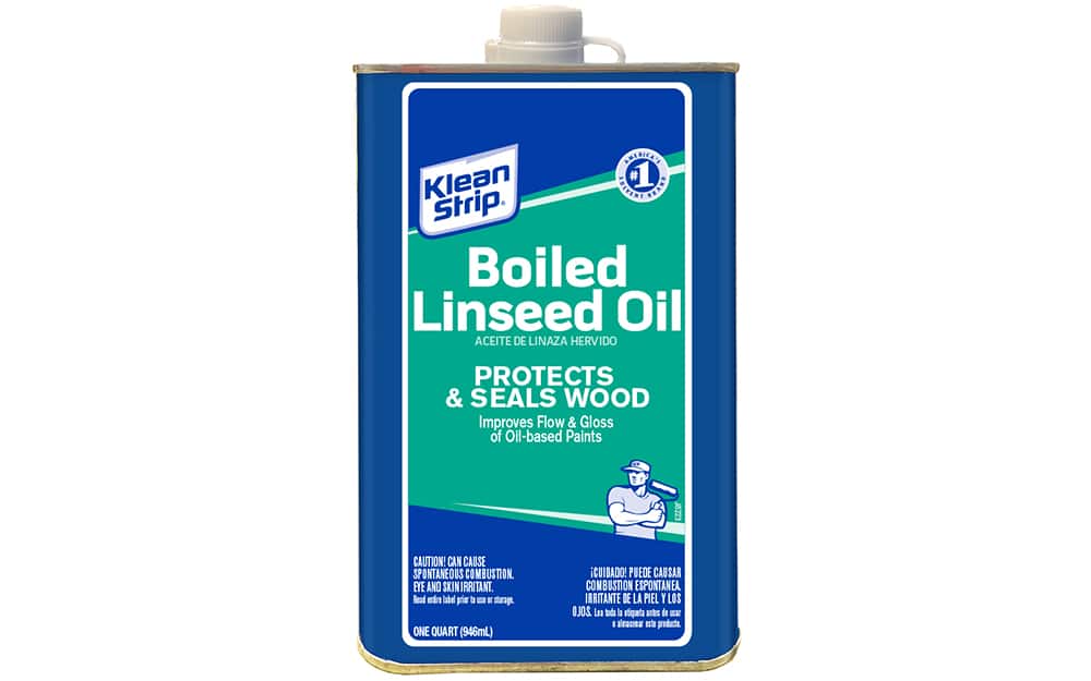 A can of linseed oil on a white background. A can of linseed oil on a white background.