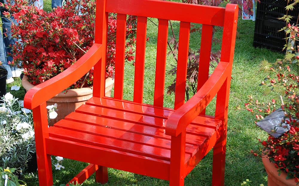 A chair finished in red lacquer. A chair finished in red lacquer.