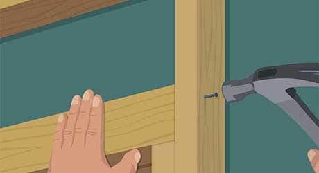 illustration of a person using a hammer to nail the jack studs into place illustration of a person using a hammer to nail the jack studs into place