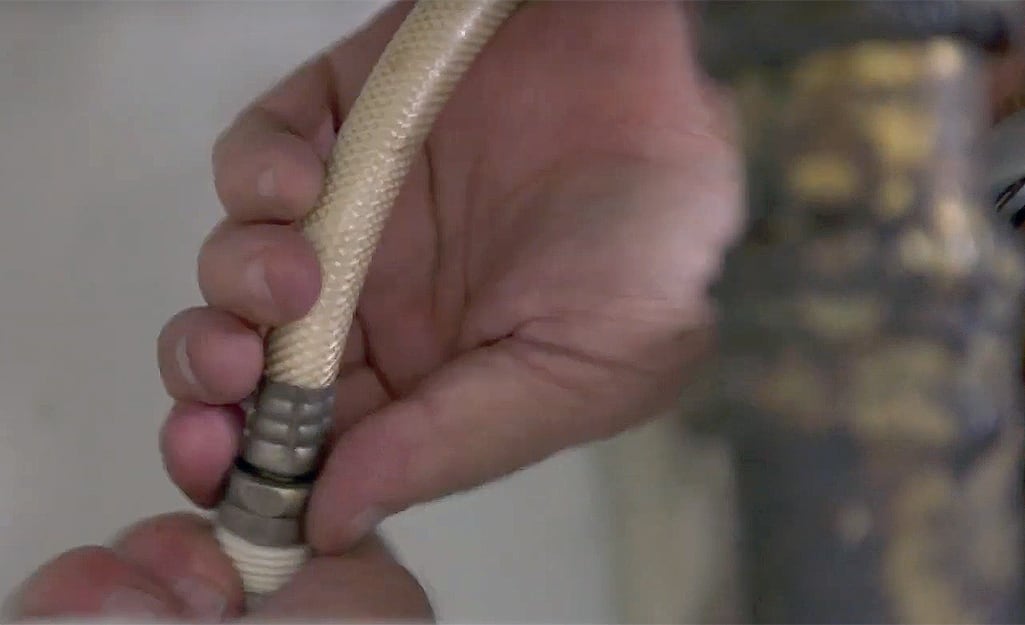 a close up of two hands connecting an adapter a close up of two hands connecting an adapter