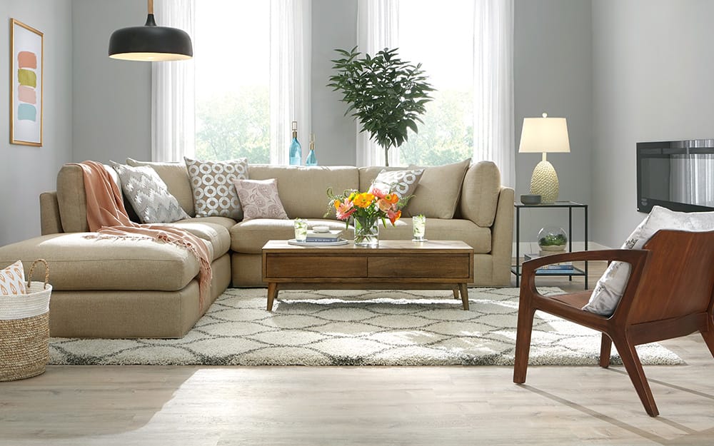 A living room with beautiful vinyl plank flooring. A living room with beautiful vinyl plank flooring.