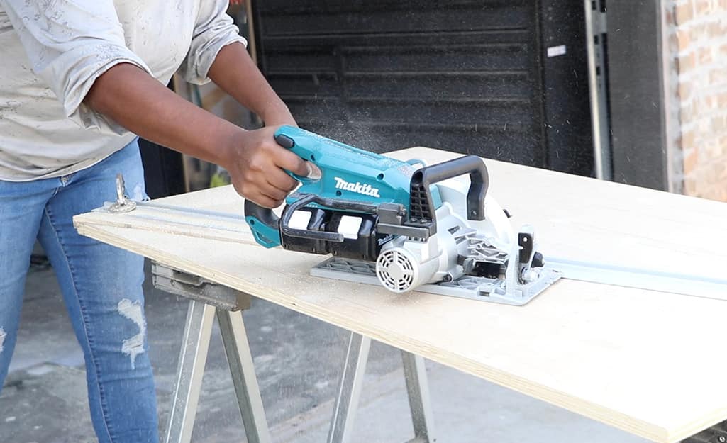 A circular saw is used to cut wood. A circular saw is used to cut wood.