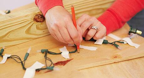 Drill holes - Make Holiday Tree Yard Decor Drill holes - Make Holiday Tree Yard Decor