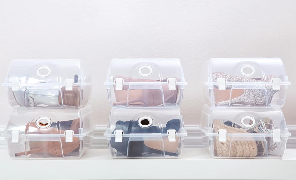 Shoes placed in clear plastic storage containers. Shoes placed in clear plastic storage containers.