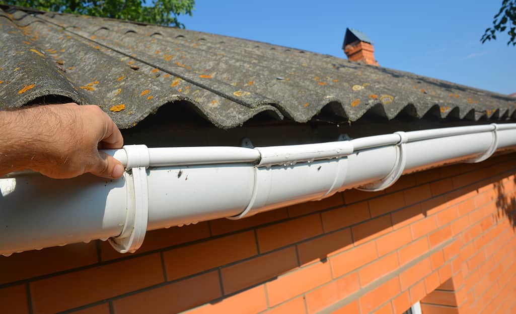A sagging gutter on a home. A sagging gutter on a home.