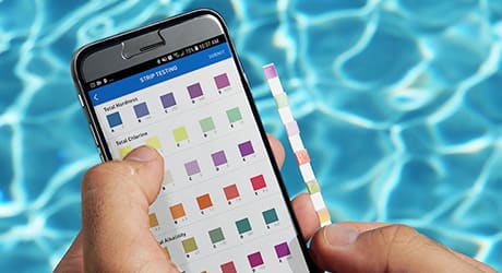 Using pool test strips Using pool test strips