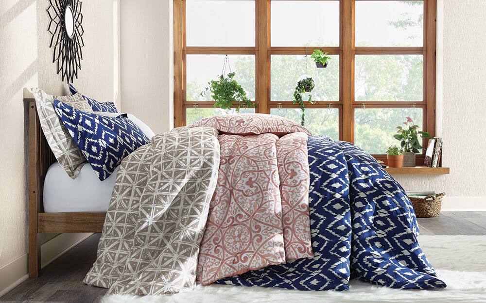 Master bedroom with coordinated bedding in different colors. Master bedroom with coordinated bedding in different colors.