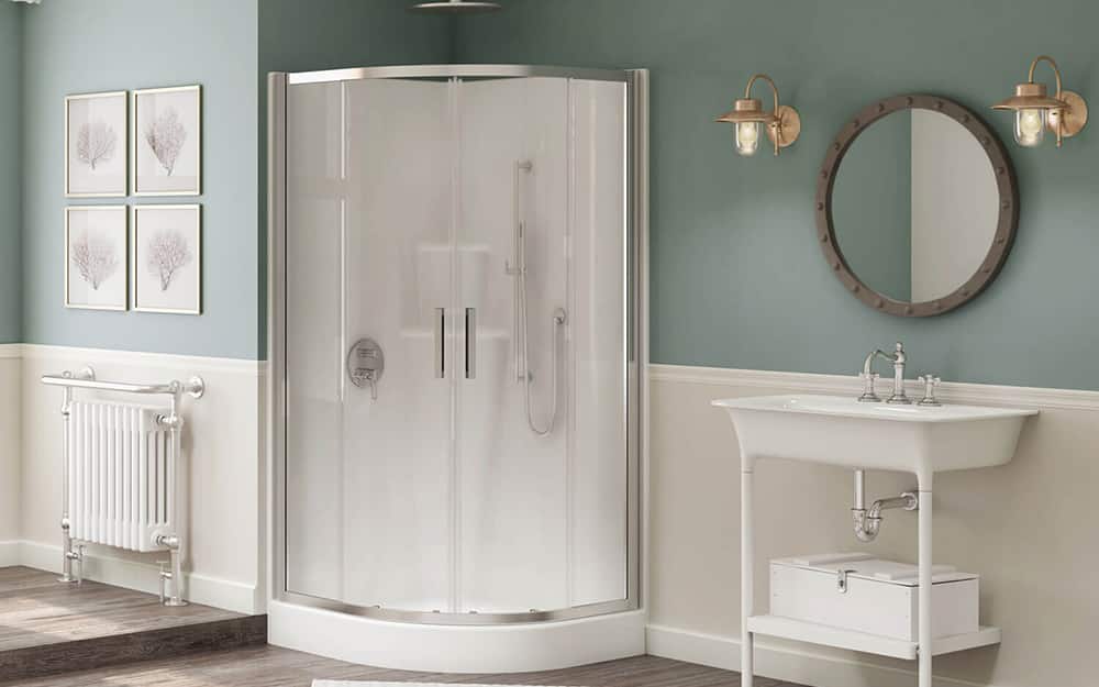 A bathroom with a corner shower that has round shower doors. A bathroom with a corner shower that has round shower doors.