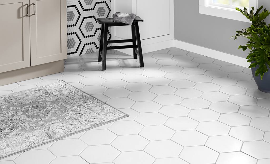 Tile flooring installed in a bathroom. Tile flooring installed in a bathroom.