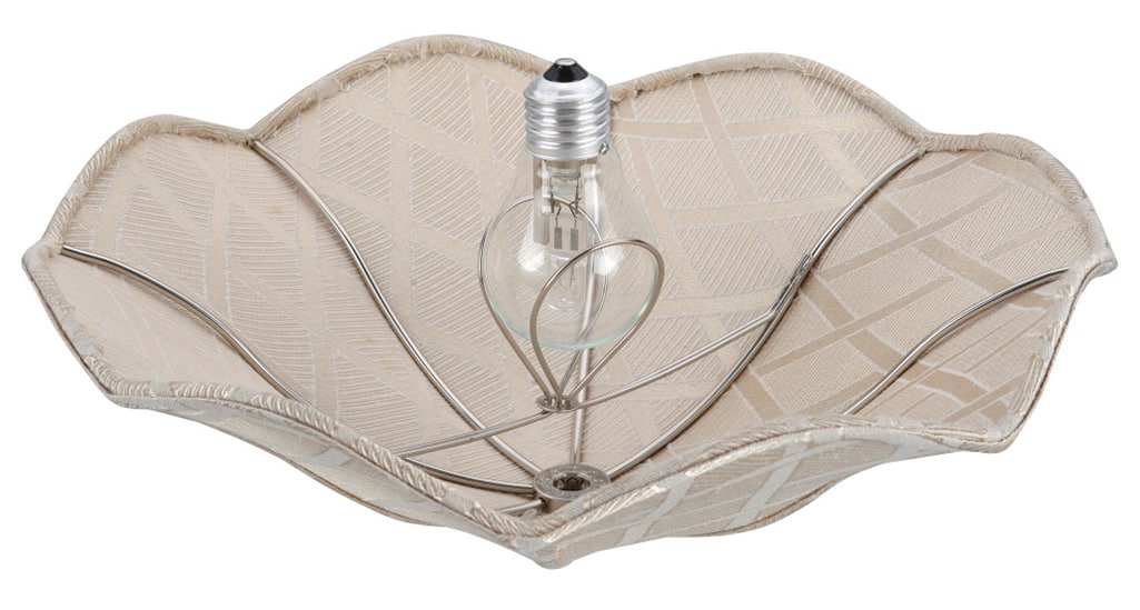 A lamp shade with a clip on fitter. A lamp shade with a clip on fitter.