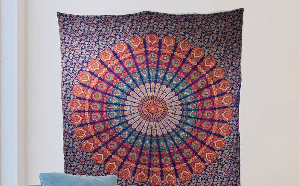 A large tapestry hung as wall art.