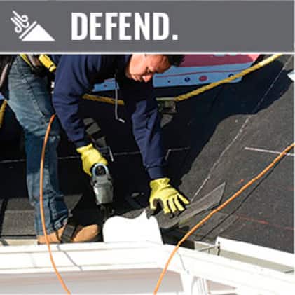Image of man installing Owens Corning Starter Strip at eaves