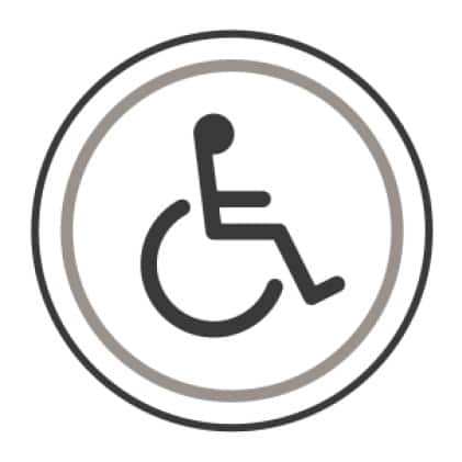 An icon of the international symbol of access. A stylized person sits in a wheelchair.