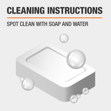 Spot clean area rug with soap and water.