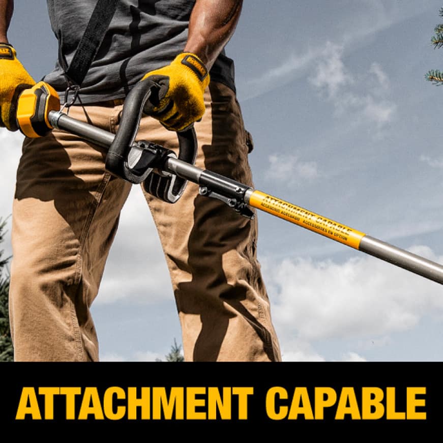 Man Trimming Yard with Dewalt Attachment Capable String Trimmer