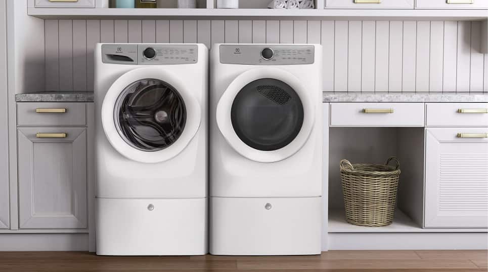 Washer and dryer on pedestals in laundry room Washer and dryer on pedestals in laundry room
