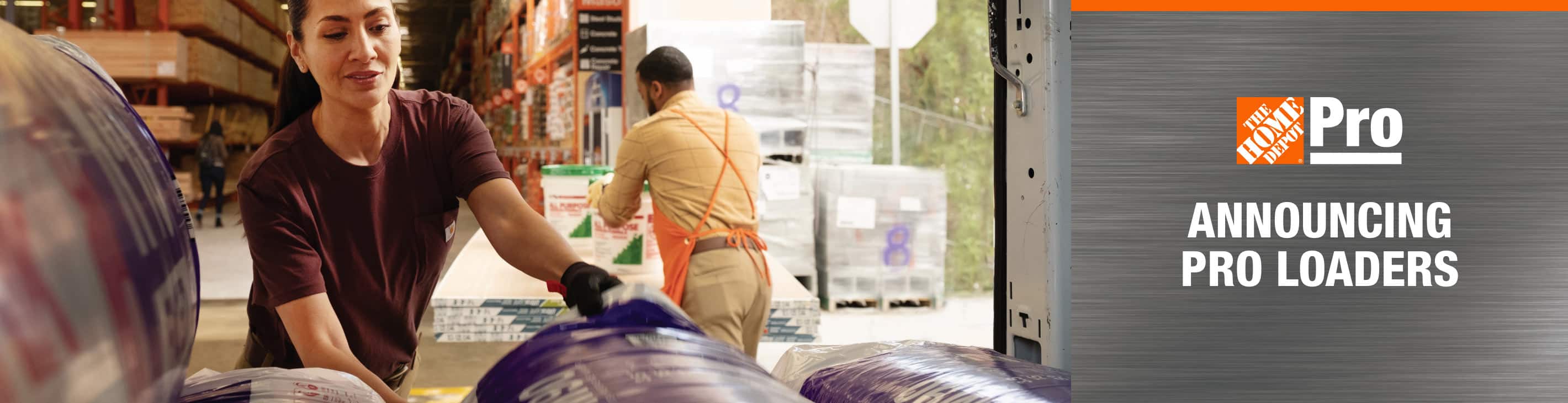 Home Depot associate loading Pro's pickup with building materials